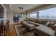 Relaxing living room boasts a sectional sofa and large windows with scenic views at 7913 Grasmere Dr, Boulder, CO 80301