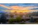 Stunning sunset over mountain range with colorful clouds at 7913 Grasmere Dr, Boulder, CO 80301