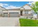 Charming single-Gathering home with a well-manicured lawn, inviting front porch, and spacious two-car garage at 4621 Cattle Cross Trl, Castle Rock, CO 80104