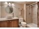 Cozy bathroom with a unique sink and a convenient shower at 15333 Heritage Cir, Thornton, CO 80602