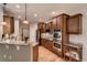 Spacious kitchen featuring stainless steel appliances and granite countertops at 15333 Heritage Cir, Thornton, CO 80602