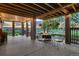 Covered patio with a cozy fire pit and views of the surrounding landscape at 15333 Heritage Cir, Thornton, CO 80602