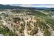 Beautiful panoramic aerial shot showing the home, area, and surrounding neighborhood at 11398 Ranch Elsie Rd, Golden, CO 80403