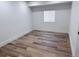 Cozy bedroom with wood flooring and natural light at 1455 S Tennyson St, Denver, CO 80219