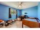 Bright bedroom with wood flooring and a ceiling fan at 5026 S Danube St, Aurora, CO 80015