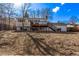 Spacious backyard with a deck is perfect for outdoor relaxation with an ATV parked underneath at 2268 S Laredo St, Aurora, CO 80013