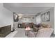 Finished basement featuring neutral carpet, fireplace and a cozy sitting area at 2268 S Laredo St, Aurora, CO 80013