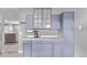 Well-organized kitchen featuring blue cabinets and ample counter space at 2268 S Laredo St, Aurora, CO 80013