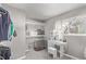 Neat closet space with shelving, natural light, and vanity table at 2268 S Laredo St, Aurora, CO 80013