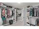 Organized walk-in closet with shelving and hanging space at 2268 S Laredo St, Aurora, CO 80013