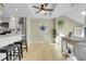 Bright, open-concept space with hardwood floors, featuring a stylish dining area and plenty of natural light at 8312 S Saulsbury St # C, Littleton, CO 80128