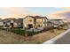 Spacious backyard featuring a patio, fire pit, and fenced yard at 3014 Furthermore Ln, Castle Rock, CO 80108