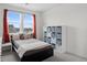 Bedroom includes large window and storage cubes for an inviting and functional space at 3014 Furthermore Ln, Castle Rock, CO 80108