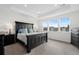 The primary bedroom features tray ceilings, plush carpet, and an abundance of natural light at 3014 Furthermore Ln, Castle Rock, CO 80108