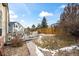 Spacious backyard deck with a fire pit and grassy area at 1434 Hickory Dr, Erie, CO 80516
