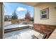 Cozy backyard patio with brick accents and comfortable seating at 1434 Hickory Dr, Erie, CO 80516