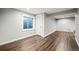 Finished basement room with wood flooring at 1434 Hickory Dr, Erie, CO 80516