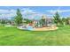 playground with swings, slides, and a shaded pavilion at 1434 Hickory Dr, Erie, CO 80516