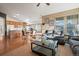 Open concept living room with kitchen views and recessed lighting at 1434 Hickory Dr, Erie, CO 80516