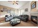 Living room with fireplace, recessed lighting, and comfortable seating at 1434 Hickory Dr, Erie, CO 80516