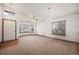 Bright and airy living room with bay windows and vaulted ceiling at 1434 Hickory Dr, Erie, CO 80516
