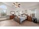 Main bedroom with carpeted floors and walk-in closet at 1434 Hickory Dr, Erie, CO 80516