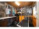 Dedicated pet grooming room featuring a grooming table, shelving, and a well-lit space for pet care at 1205 Lee St, Lakewood, CO 80215