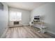 Bright bedroom with window, desk, and office setup at 13952 E Marina Dr # 310, Aurora, CO 80014