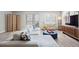 Cozy living room featuring a comfortable couch and stylish decor at 13952 E Marina Dr # 310, Aurora, CO 80014