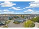 Overhead view of a residential community, highlighting the architecture, landscaping, and parking areas at 2662 S Cathay Way # 302, Aurora, CO 80013
