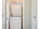 Stackable washing machine and dryer appliance within a closet setting at 2662 S Cathay Way # 302, Aurora, CO 80013