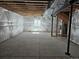 Large unfinished basement space with one window for natural light, ideal for future expansion at 6077 Idlewild Pl, Brighton, CO 80601