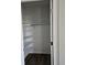 Walk-in closet provides ample storage space with shelving and a hanging rod at 6077 Idlewild Pl, Brighton, CO 80601
