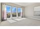 This bedroom features an abundance of natural light and scenic views at 2230 Rim Ridge Dr, Castle Pines, CO 80108