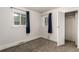Bedroom featuring a pair of windows with dark curtains and closet at 436 S 4Th Ave, Brighton, CO 80601