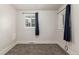 Bedroom featuring a pair of windows with dark curtains at 436 S 4Th Ave, Brighton, CO 80601