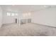 Bright bonus room featuring neutral carpet, staircase, and recessed lighting at 39440 Congress Ln, Elizabeth, CO 80107