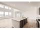 Bright kitchen featuring a center island with sink, stainless steel appliances, and recessed lighting at 39440 Congress Ln, Elizabeth, CO 80107