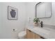 Stylish bathroom with a modern vanity and walk-in shower at 5098 E Donald, Denver, CO 80222