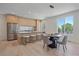 Modern kitchen with stainless steel appliances and island at 5098 E Donald, Denver, CO 80222