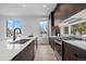 Modern kitchen with stainless steel appliances and an island at 5098 E Donald, Denver, CO 80222