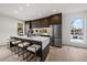 Modern kitchen with stainless steel appliances and an island at 5098 E Donald, Denver, CO 80222