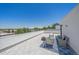 Relaxing rooftop deck boasting city views and stylish seating at 5098 E Donald, Denver, CO 80222