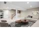 Basement featuring a comfortable living area with stylish furniture, great for relaxing or entertaining at 777 Whispering Oak Dr, Castle Rock, CO 80104