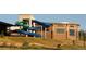 Waterpark featuring slides, swimming pools, and recreational amenities providing entertainment for all ages at 777 Whispering Oak Dr, Castle Rock, CO 80104