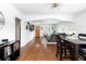 Open-concept living room with hardwood floors and modern decor at 489 S Gaylord St, Denver, CO 80209