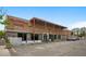 Commercial brick building with street parking and covered entrance at 14 S Lincoln St # 16, Denver, CO 80209
