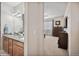 Bathroom with double vanity and granite countertop at 9334 Kilmer Way, Arvada, CO 80007