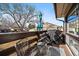 Cozy balcony with comfortable seating and grill, perfect for outdoor relaxation at 1161 S Marshall St, Lakewood, CO 80232