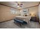 Cozy bedroom with neutral colors, plush carpeting, and ample natural light at 1161 S Marshall St, Lakewood, CO 80232